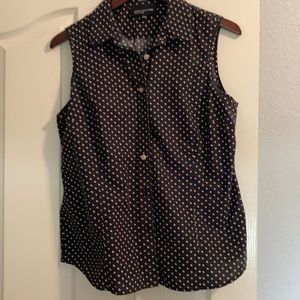 Navy and tan polka dotted sleeveless shirt